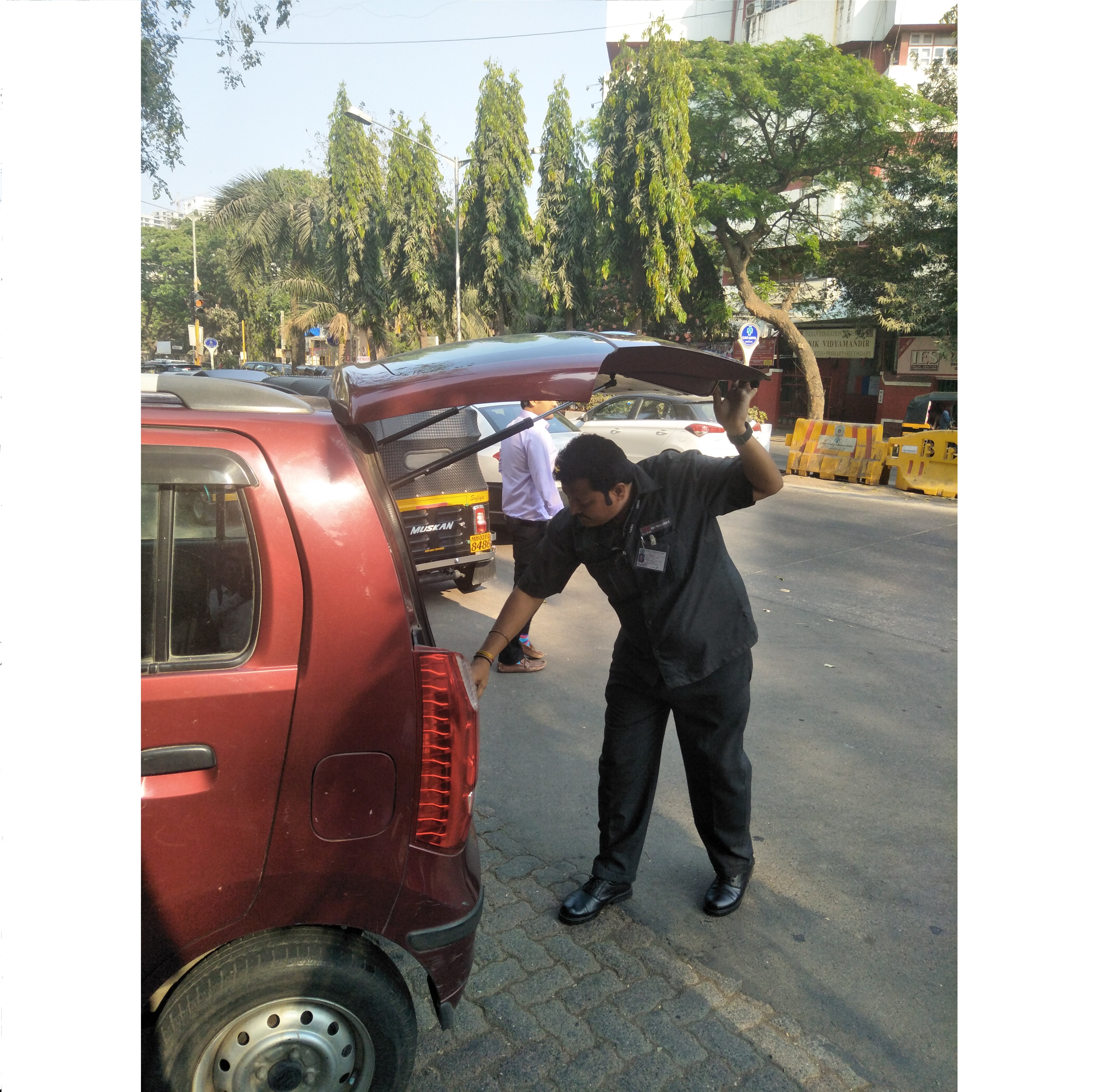 GBS Security Guard Performing Vehicle Check